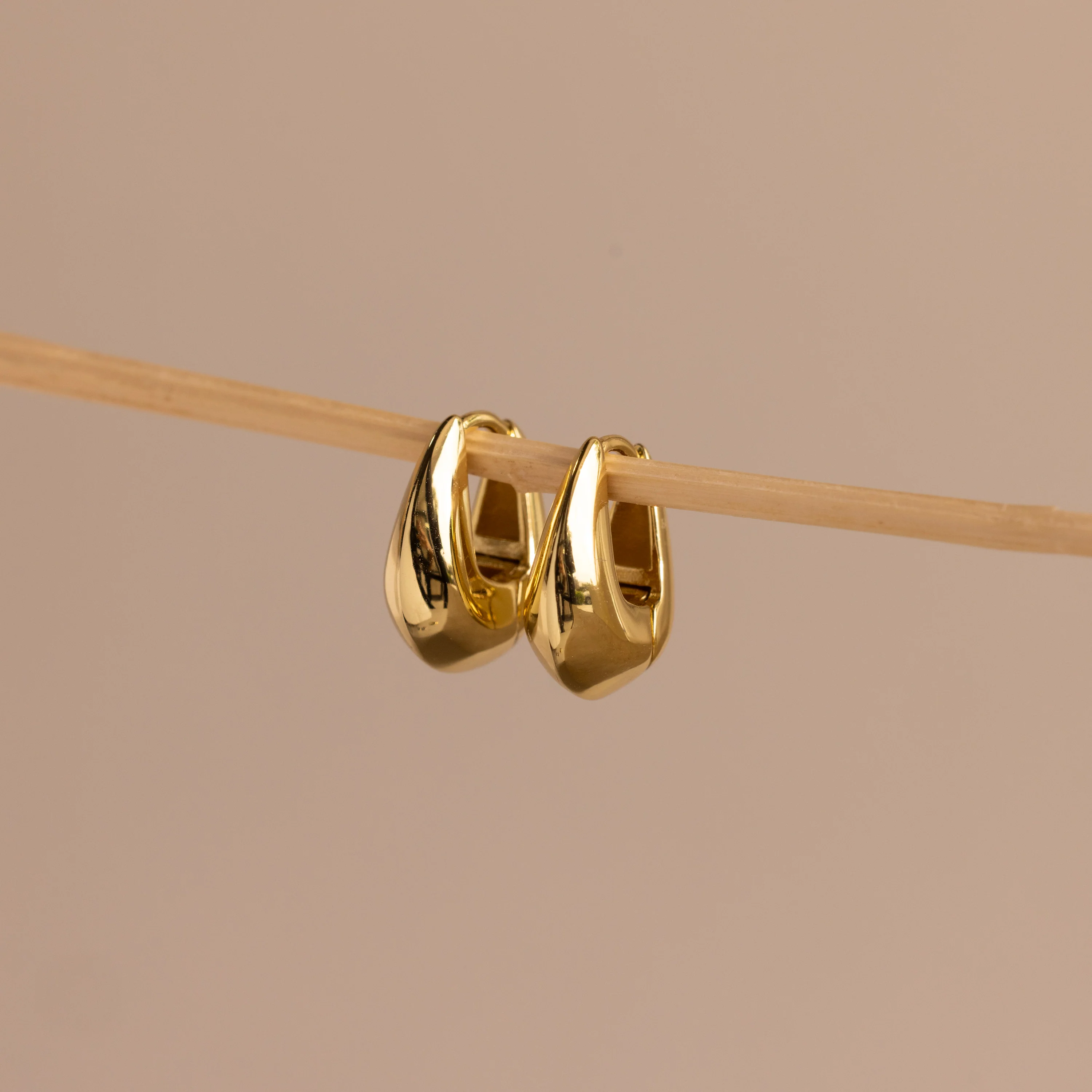Bold Oval Huggies in 18K Gold