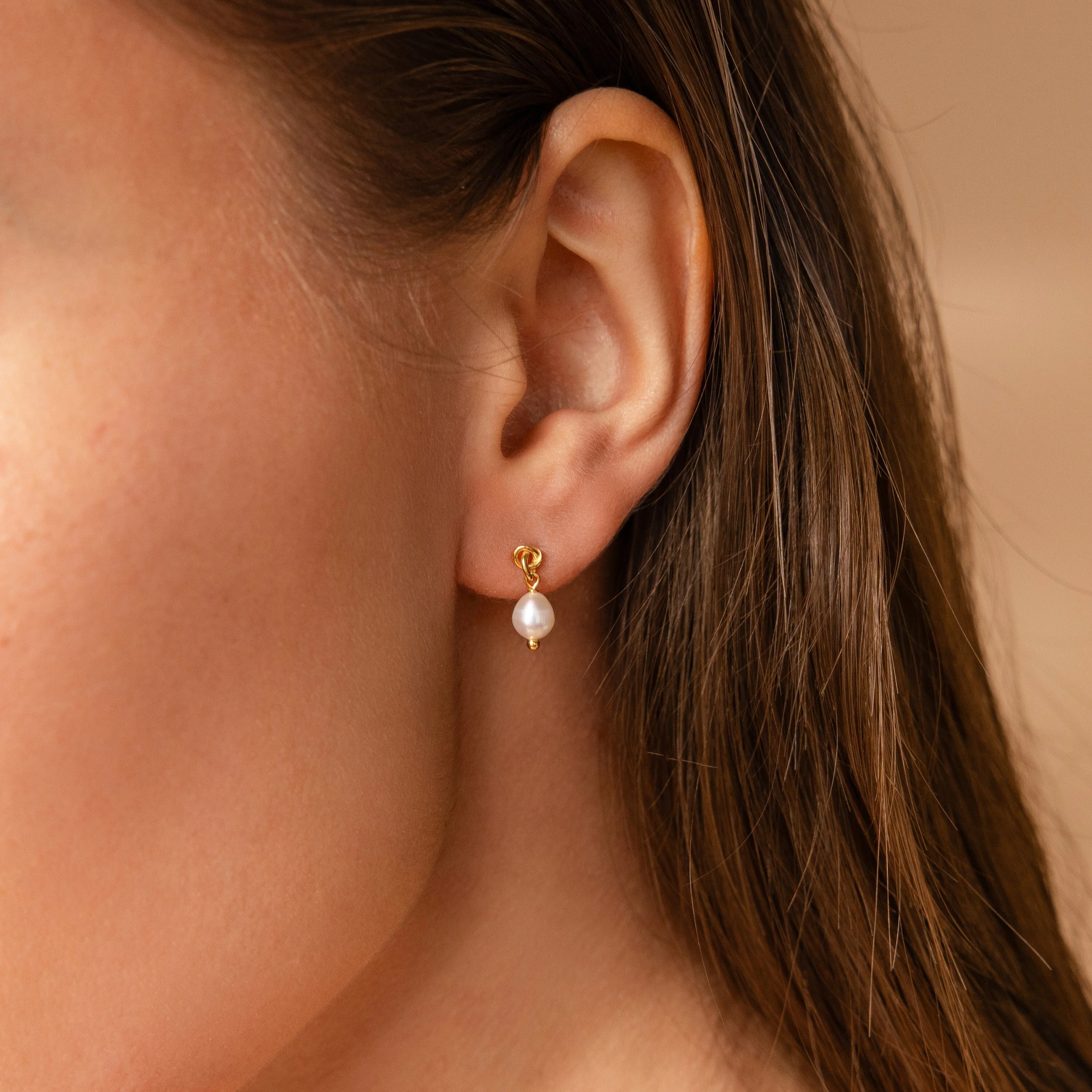 Dainty Knot Pearl Earrings in 18K Gold - Image 2