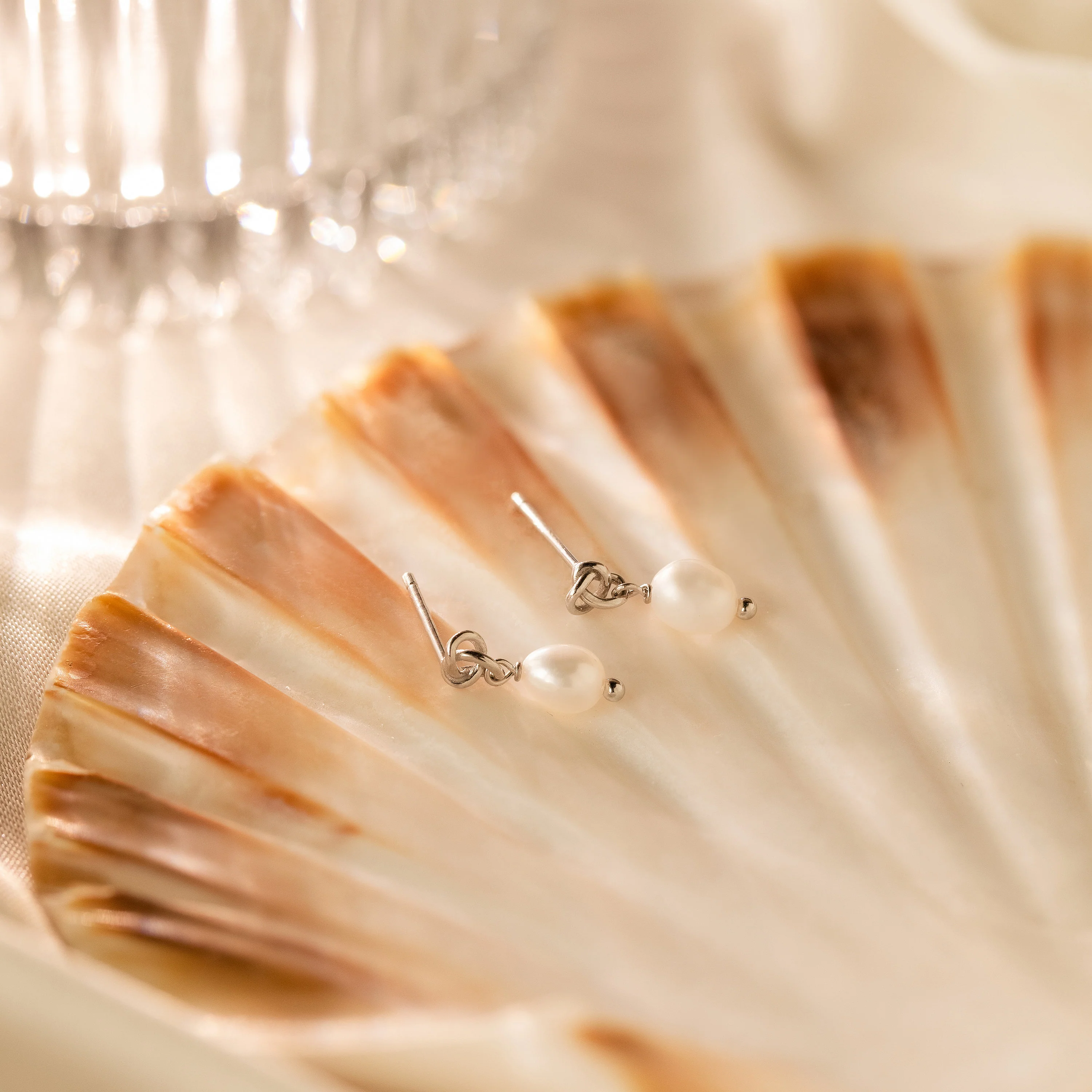 Dainty Knot Pearl Earrings in Silver