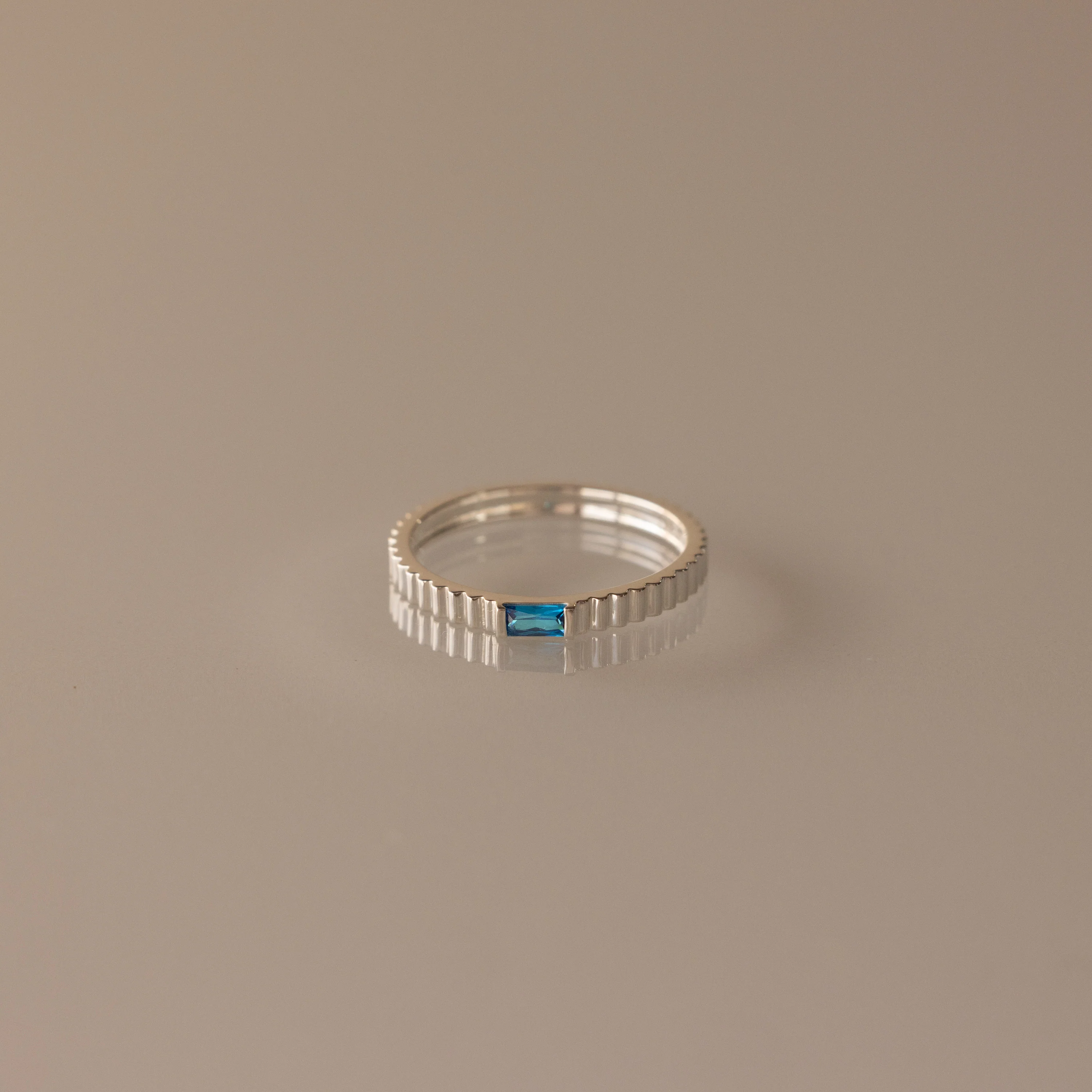 Dainty Ribbed Blue Zircon Ring - Image 3