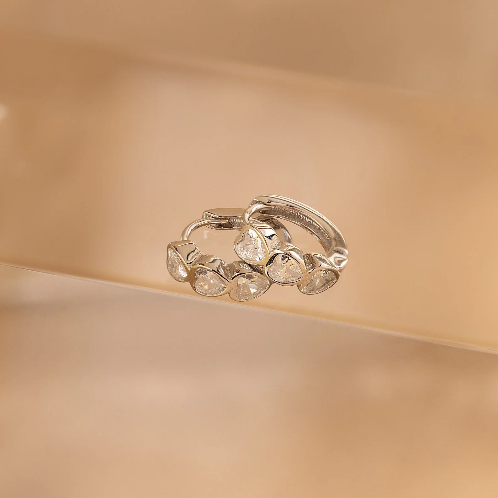 Diamond Bezel Heart Huggies - Image 5