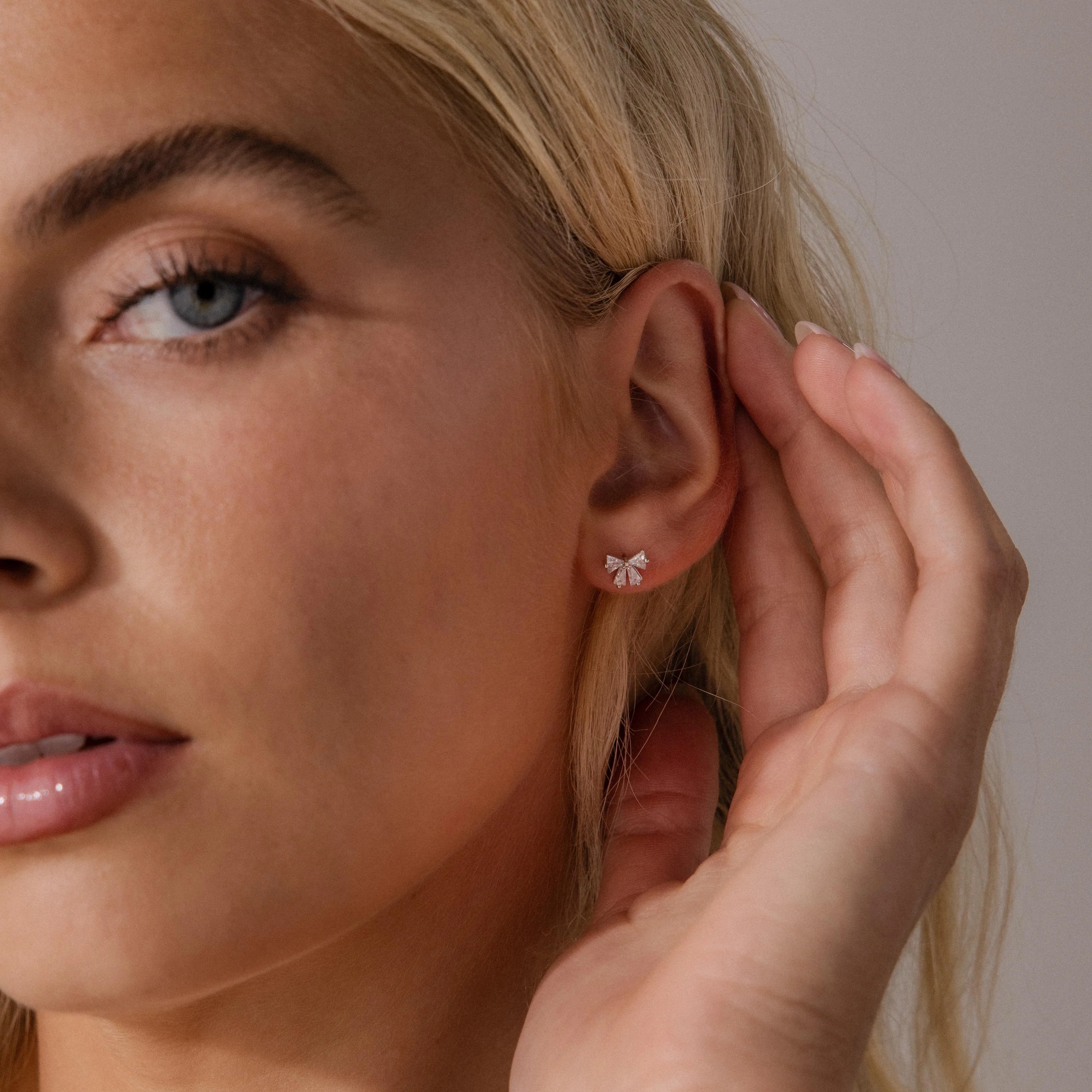 Diamond Bow Studs in Silver - Image 4