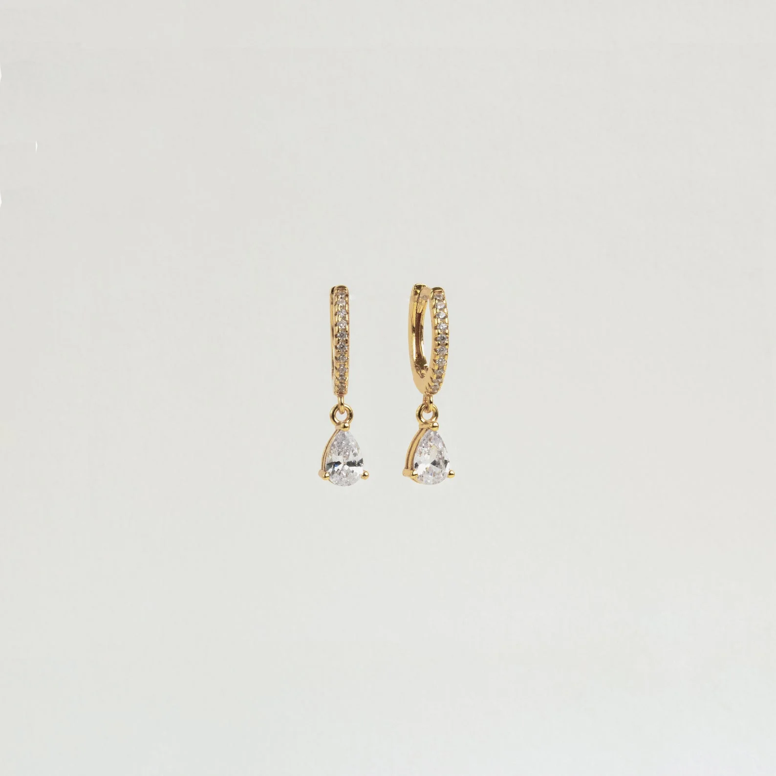 Diamond Drop Huggies in 18K Gold - Image 5