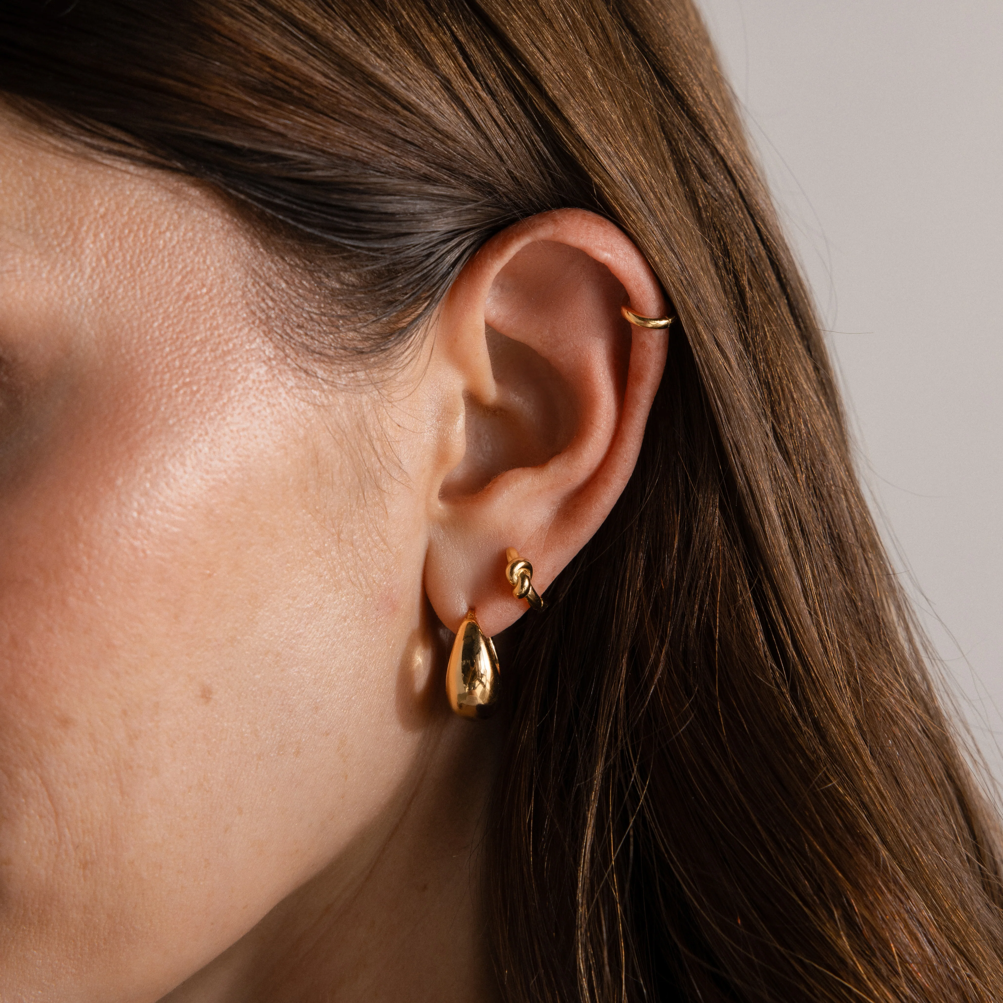 Love Knot Huggies in 18K Gold - Image 6