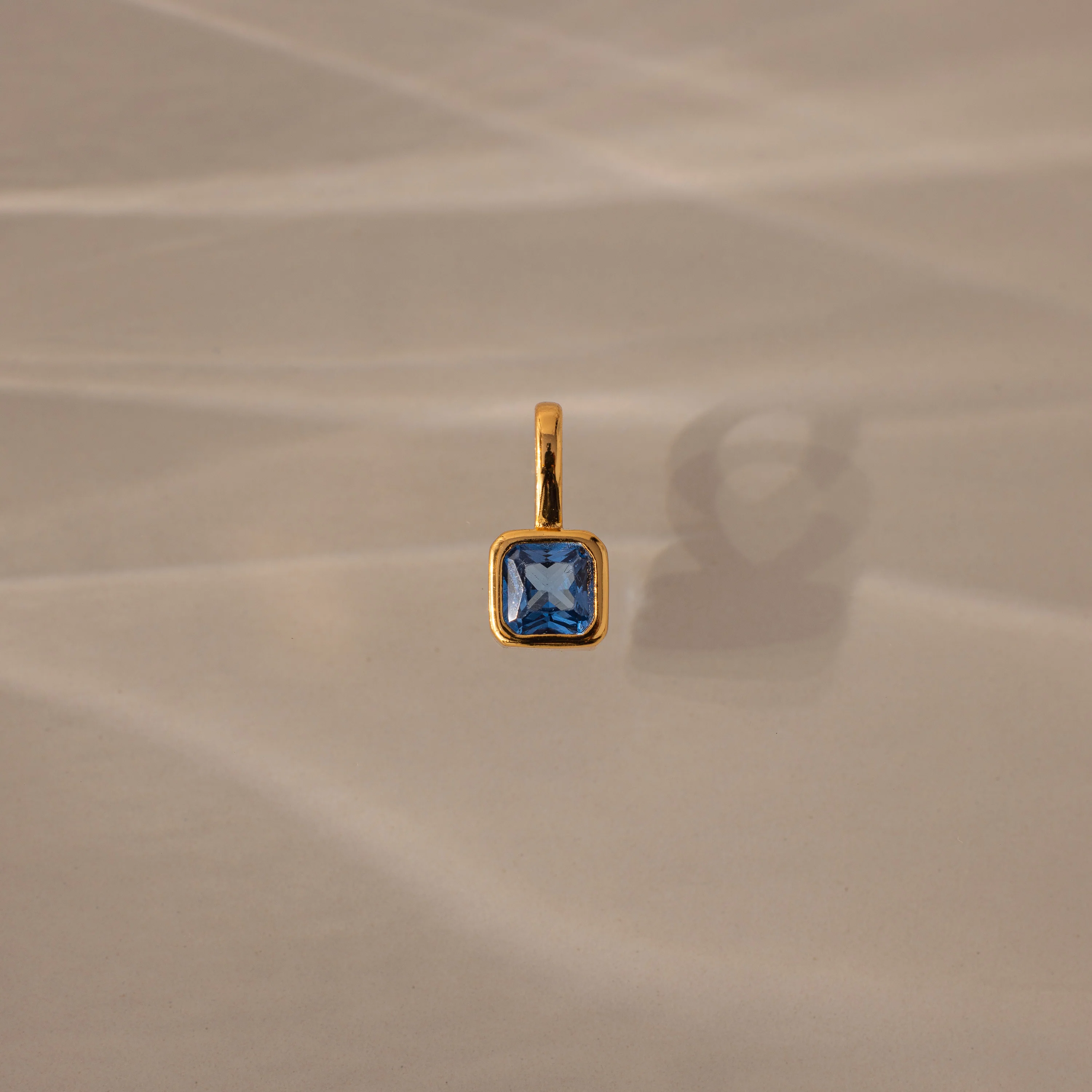 Square Bezel Blue Zircon Charm