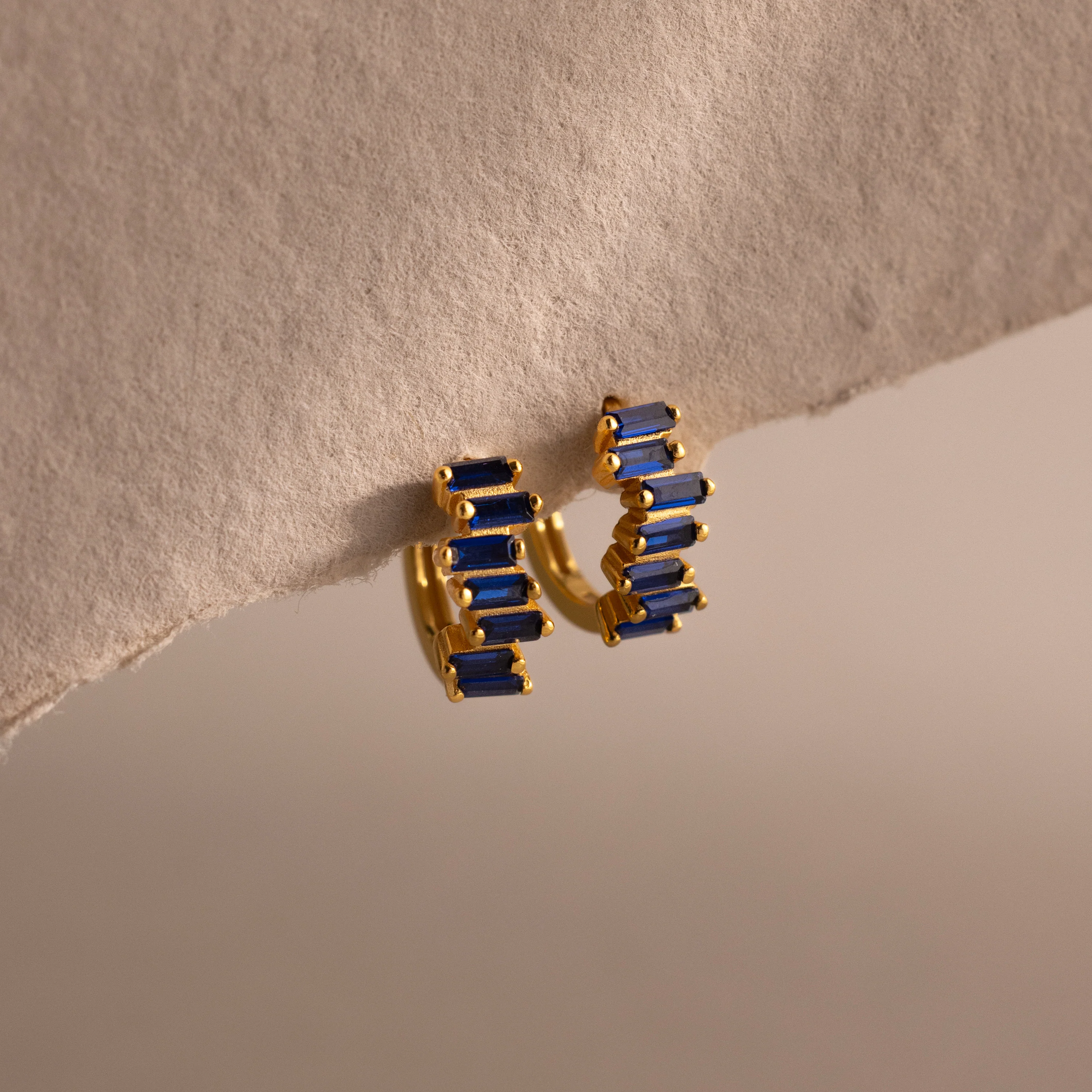 Staggered Baguette Sapphire Huggies
