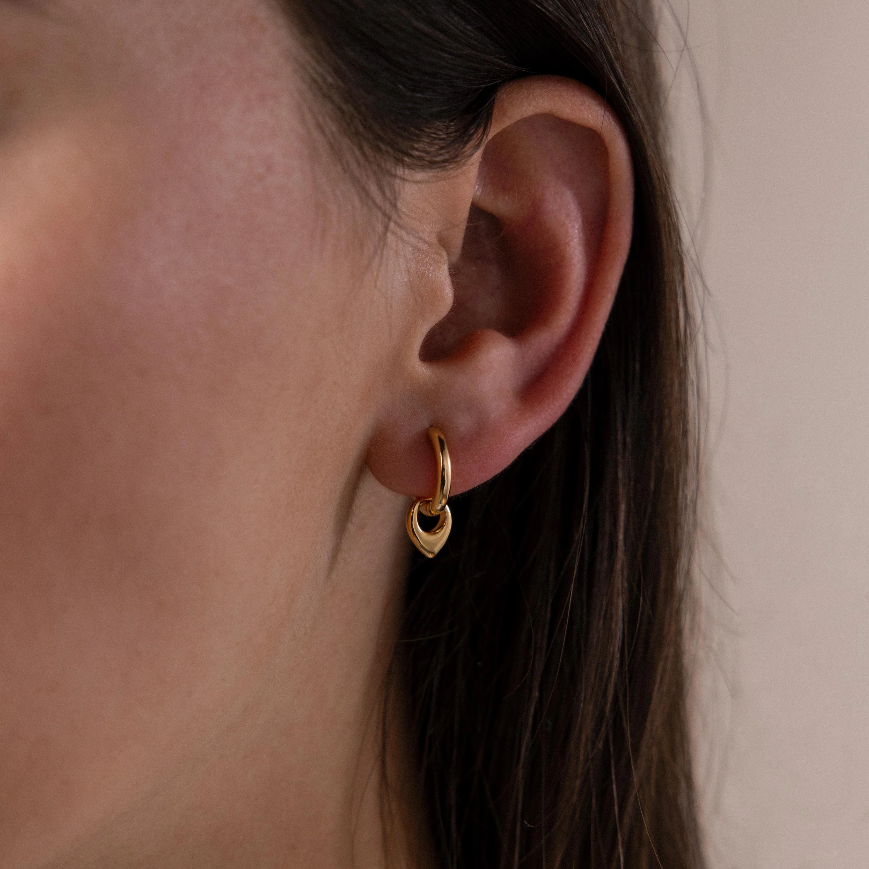 Tiny Teardrop Huggies in 18K Gold - Image 2