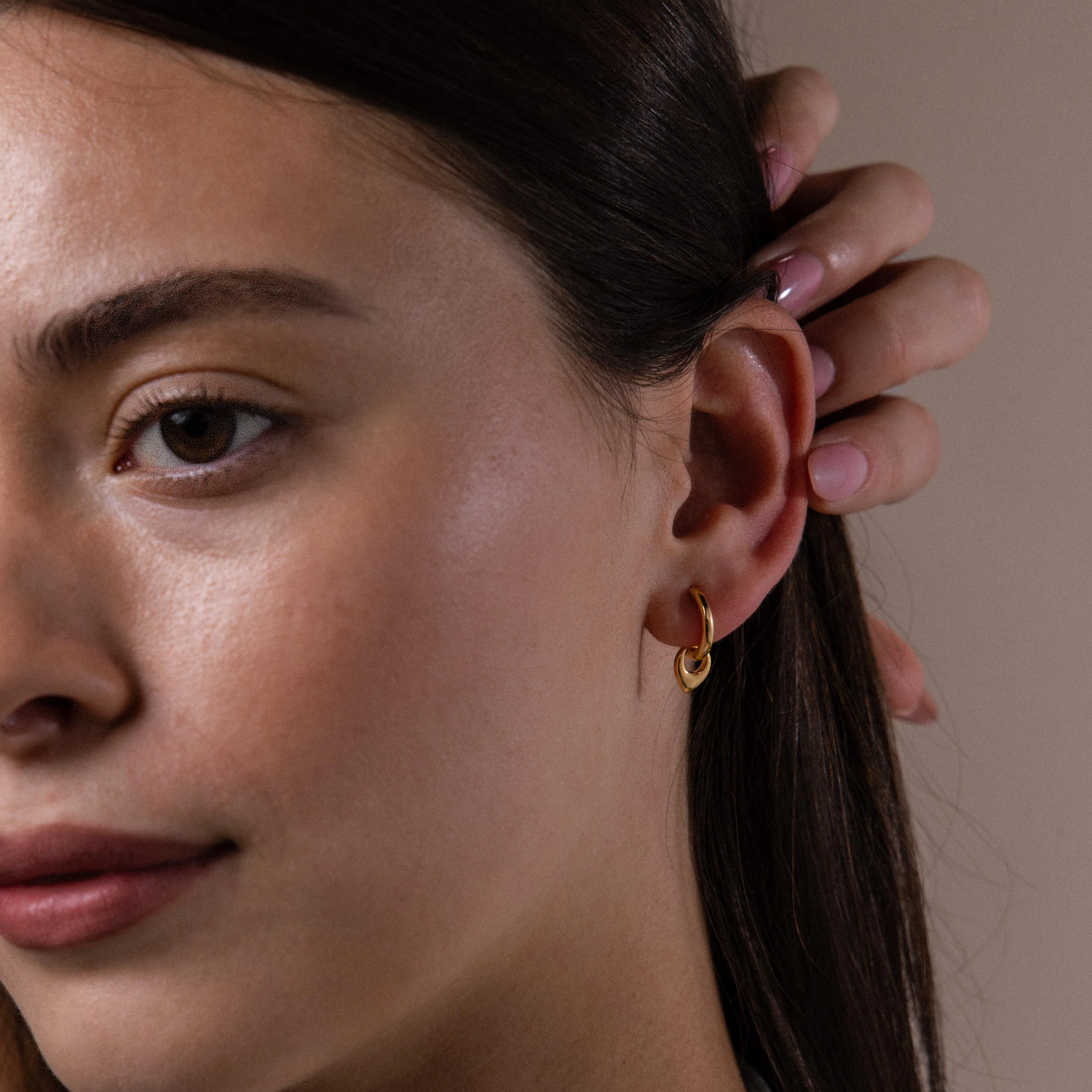 Tiny Teardrop Huggies in 18K Gold - Image 4